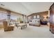 Spacious main bedroom with sitting area, large windows and neutral carpeting at 26764 E Canyon Ave, Aurora, CO 80016