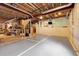Unfinished basement features exposed beams and ductwork, offering potential for customization at 11411 W Cooper Dr, Littleton, CO 80127
