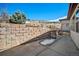 Backyard stone retaining wall adds dimension to the landscaped outdoor space at 4415 Echo Ct, Larkspur, CO 80118