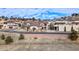 Beautiful home surrounded by a brick wall and fence at 4415 Echo Ct, Larkspur, CO 80118
