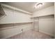 Spacious walk-in closet with ample shelving and storage space at 4415 Echo Ct, Larkspur, CO 80118