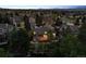 Aerial view showcases this home's backyard, deck, and lovely surrounding neighborhood at 2317 Wynterbrook Dr, Highlands Ranch, CO 80126