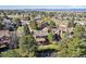 Stunning aerial view showcases the property surrounded by lush greenery and neighborhood at 2317 Wynterbrook Dr, Highlands Ranch, CO 80126