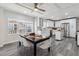 Well-lit kitchen and dining area featuring modern appliances and ample seating at 3929 Federal Blvd, Denver, CO 80211