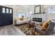Comfortable living room with fireplace and neutral tones at 3929 Federal Blvd, Denver, CO 80211