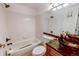 Classic bathroom with bathtub/shower combination, toilet, and vessel sink vanity at 5283 E 131St Dr, Thornton, CO 80241