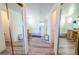 Bright bathroom boasts double sinks, and a glass-enclosed shower, offering a clean and modern look at 5283 E 131St Dr, Thornton, CO 80241