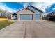 This property has a two-car garage with an extra space for parking on the side, enough for all your vehicles at 5283 E 131St Dr, Thornton, CO 80241