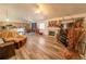 The home features a spacious living room, fireplace, and open design, creating a perfect entertainment space at 5283 E 131St Dr, Thornton, CO 80241