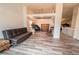 The home features an open floor plan, hardwood floors, and ample space for furniture at 5283 E 131St Dr, Thornton, CO 80241