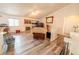 This home features an open living room and is well-lit by natural light from the windows around the room at 5283 E 131St Dr, Thornton, CO 80241