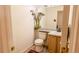 Simple powder room features a toilet and sink at 5283 E 131St Dr, Thornton, CO 80241