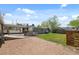Spacious backyard with gravel area, small patch of grass, and a versatile layout at 895 Nile Ct, Golden, CO 80401