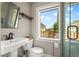 Bathroom featuring a modern vanity and natural light at 895 Nile Ct, Golden, CO 80401