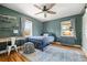 Bedroom with hardwood floors, ceiling fan, and modern furnishings at 895 Nile Ct, Golden, CO 80401