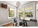 Bright dining area with hardwood floors and backyard view at 895 Nile Ct, Golden, CO 80401