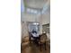 Dining area with high ceilings, many windows for natural light, and contemporary decor at 14232 Piney River Rd, Broomfield, CO 80023