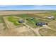 Expansive property featuring a charming home, a large workshop, and vast open spaces at 32800 E 137Th Way, Brighton, CO 80603