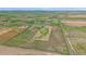 Drone's-eye-view of property featuring acreage, structures, and surrounding area at 32800 E 137Th Way, Brighton, CO 80603