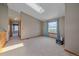 Bright bedroom with skylight and windows offering beautiful scenic views at 32800 E 137Th Way, Brighton, CO 80603