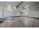 Spacious garage with high ceilings, utility door, and plenty of room for vehicles and storage at 32800 E 137Th Way, Brighton, CO 80603
