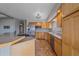 Kitchen with stainless steel appliances and wooden cabinets at 32800 E 137Th Way, Brighton, CO 80603