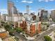 Stunning aerial view of the community and the downtown cityscape at 1975 N Grant St # 810, Denver, CO 80203