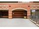The building entrance with covered parking, brick design, and the name Grant Park at 1975 N Grant St # 810, Denver, CO 80203