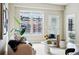 Bright living room with contemporary decor and a view of the neighborhood at 1975 N Grant St # 810, Denver, CO 80203