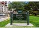 Denver Parks & Recreation sign for Benedict Fountain Park with greenery and buildings at 1975 N Grant St # 810, Denver, CO 80203