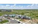 Aerial view of pool, clubhouse, and playground amenities at 2105 Bellcove Dr, Castle Pines, CO 80108
