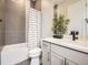 Neat bathroom with a shower/tub combination and updated vanity with modern fixtures at 2105 Bellcove Dr, Castle Pines, CO 80108
