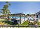 Community pool with lounge area, grill, and seating at 2105 Bellcove Dr, Castle Pines, CO 80108