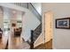 Bright foyer with wood floors and staircase leading to the second floor at 286 Western Sky Cir, Longmont, CO 80501