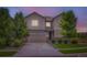 Charming two-story home with well-manicured landscaping, a spacious garage and inviting curb appeal at 286 Western Sky Cir, Longmont, CO 80501
