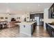 Open concept kitchen and living room, perfect for entertaining guests at 286 Western Sky Cir, Longmont, CO 80501