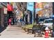 Bustling street view showcasing local shops, restaurants, and pedestrian activity in downtown Longmont at 286 Western Sky Cir, Longmont, CO 80501