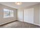 This bedroom offers neutral colors, a window for natural light and a closet for ample storage at 10117 Wyandott N Cir, Thornton, CO 80260