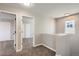 Upstairs hallway with carpet and doors leading to rooms at 10117 Wyandott N Cir, Thornton, CO 80260