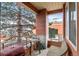 Relax on this private balcony, perfect for grilling and enjoying the outdoors with a cozy chair and table at 4100 Albion St # 314, Denver, CO 80216