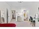Bright, open bedroom shows doorways to the kitchen and bathroom, and features a modern vanity at 4100 Albion St # 314, Denver, CO 80216