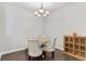 Elegant dining room with a round table and comfortable seating at 4100 Albion St # 314, Denver, CO 80216