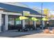 Ester's exterior with green umbrellas at 4100 Albion St # 314, Denver, CO 80216