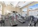 Well-equipped gym featuring modern treadmills, elliptical machines, and weights for residents at 4100 Albion St # 314, Denver, CO 80216