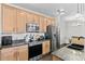 Modern kitchen featuring stainless steel appliances and stylish granite countertops at 4100 Albion St # 314, Denver, CO 80216
