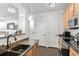 Well-designed kitchen featuring granite countertops and stainless steel appliances at 4100 Albion St # 314, Denver, CO 80216