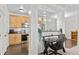 Open-concept kitchen with modern lighting and a convenient breakfast bar at 4100 Albion St # 314, Denver, CO 80216