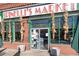 Charming neighborhood market with vintage signage and inviting storefront is a local favorite at 4100 Albion St # 314, Denver, CO 80216