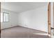 Bedroom with carpet and a window at 8701 Huron St # 5-210, Thornton, CO 80260