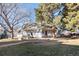 Charming townhome featuring a well-maintained lawn, mature trees, and convenient front access at 8701 Huron St # 5-210, Thornton, CO 80260